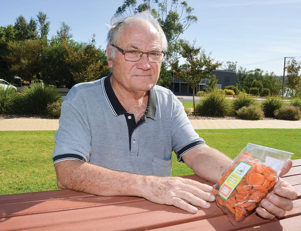 Fruit growers under the pump post image