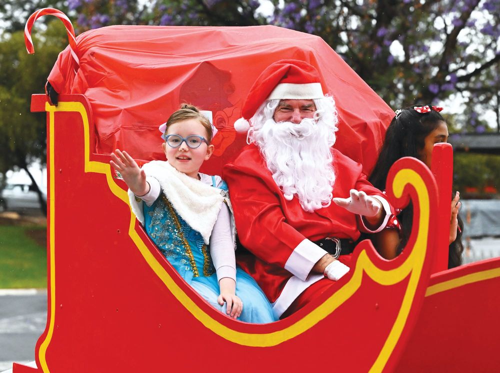 Rain adds to Christmas pageant atmosphere post image