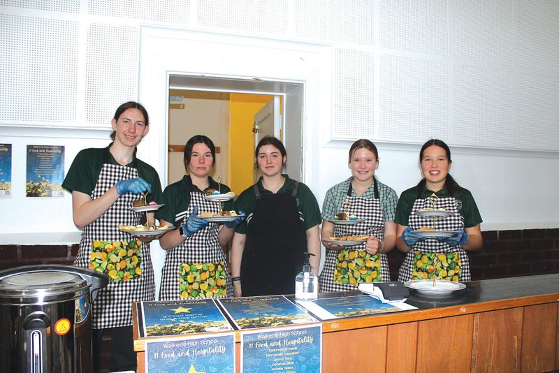 Local students serve flower show high teas post image