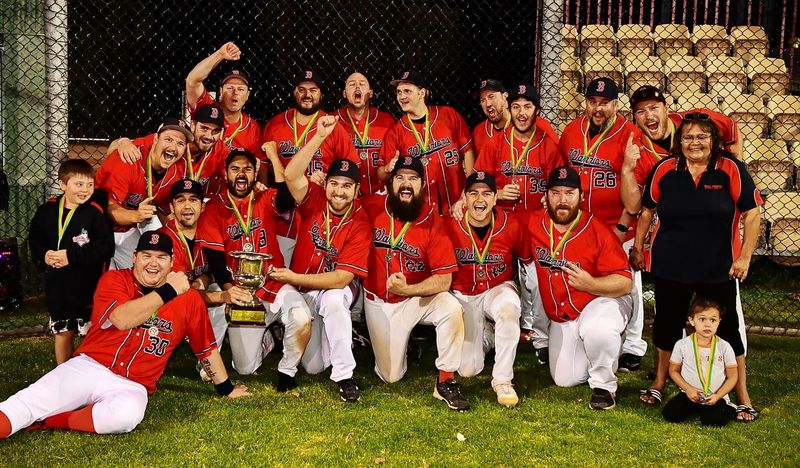 Riverland baseball painted Red post image