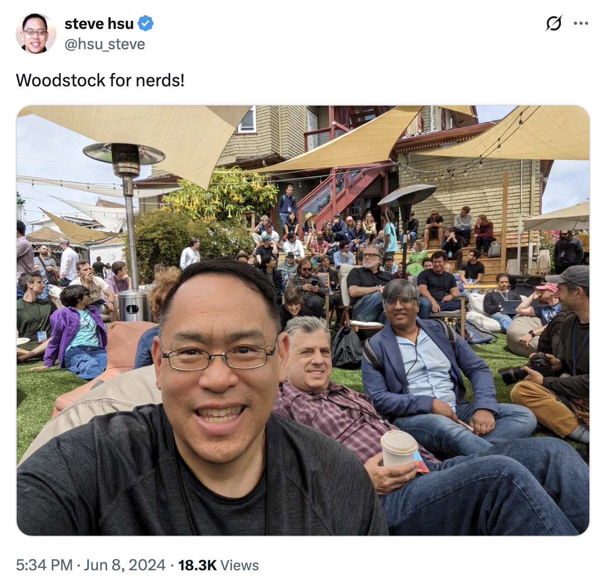 Steve Hsu (@hsu_steve) tweets a selfie at Manifest 2024 with the caption "Woodstock for nerds!"