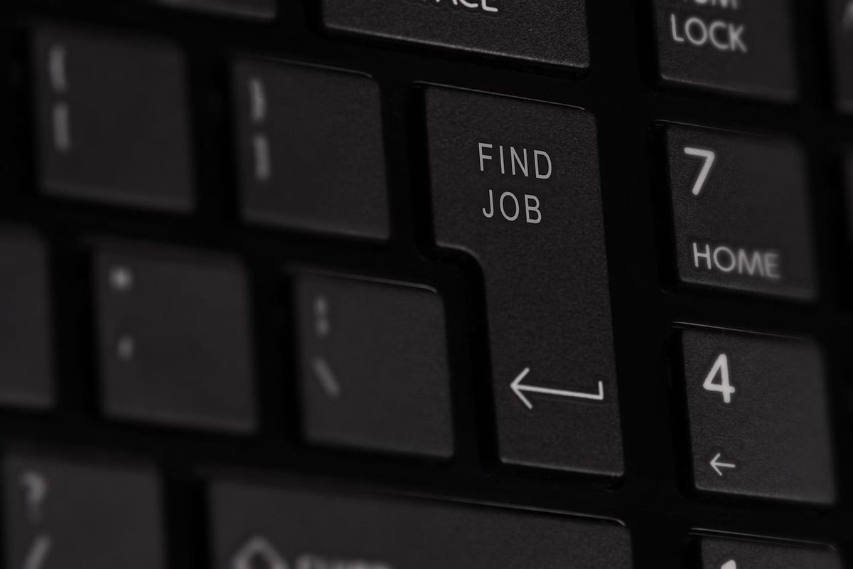 Keyboard with 'Find Job' tab.