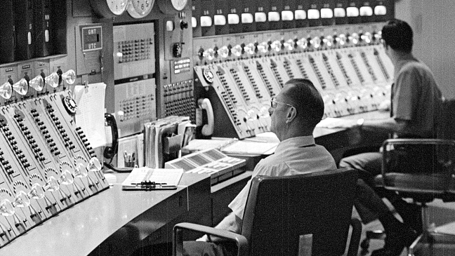 Library of Congress Image:Men seated in control room at the Voice of America radio broadcasting studio