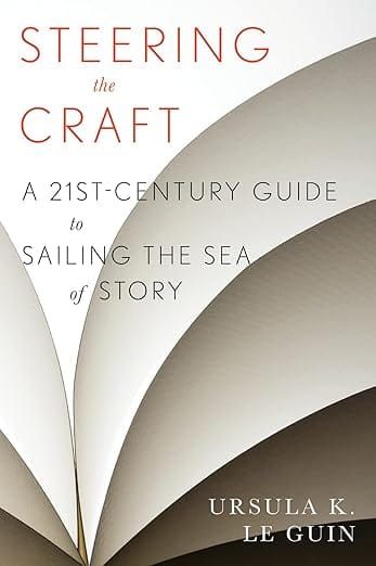 Cover of Steering the Craft. White arcs resemble book pages or sails behind sans serif font.
