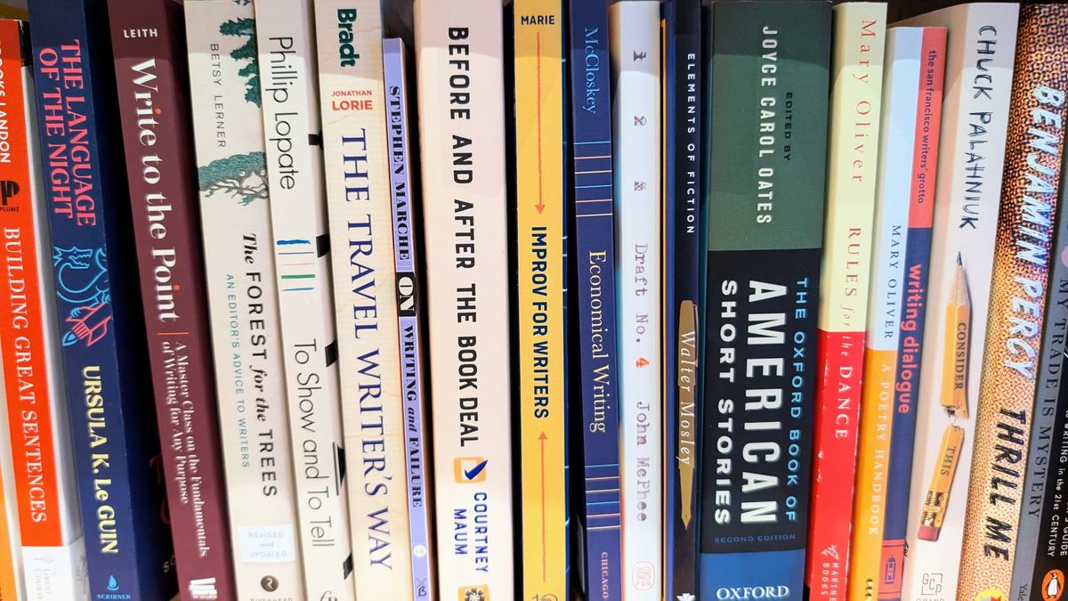 A shelf of mostly writing related books.