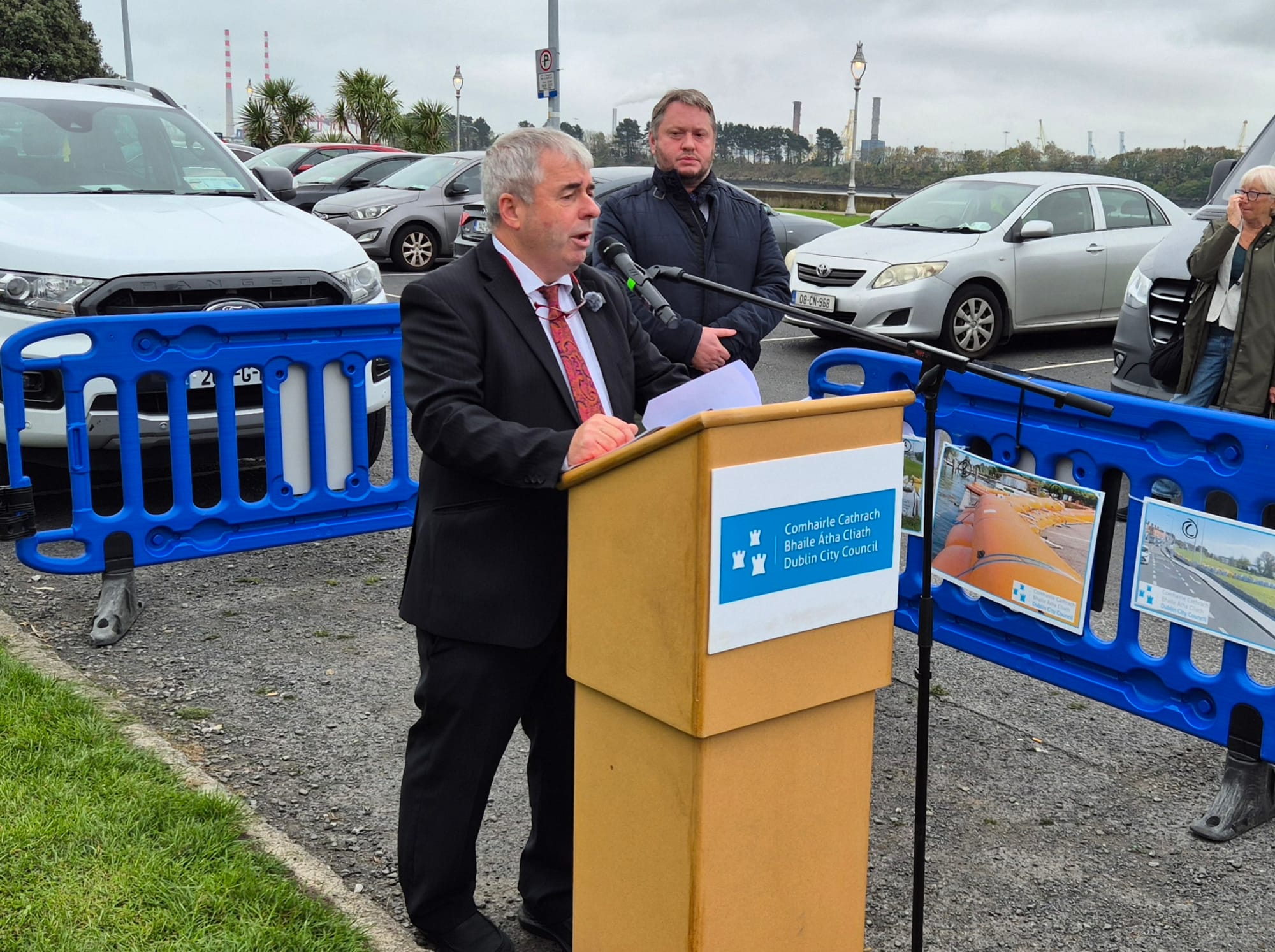 Minister of State Kevin "Boxer" Moran unveiling temporary flood-defence measures in Clontarf yesterday.