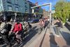 People on bikes in a cycle lane. Photo by Sunni Bean.