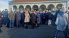 A crowd paying respect to Bill Abom outside the church of the Good Shepherd in Churchtown