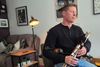 An uilleann piper, with one eye on tradition, takes to the big stages