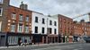Council contemplates demolition of largely vacant homeless hostel, a decade after activists tried to rescue it