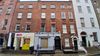 Under new rules, what might become of two apartments on South William Street, rented for years as short-term lets?