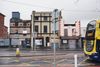 A row of derelict buildings.