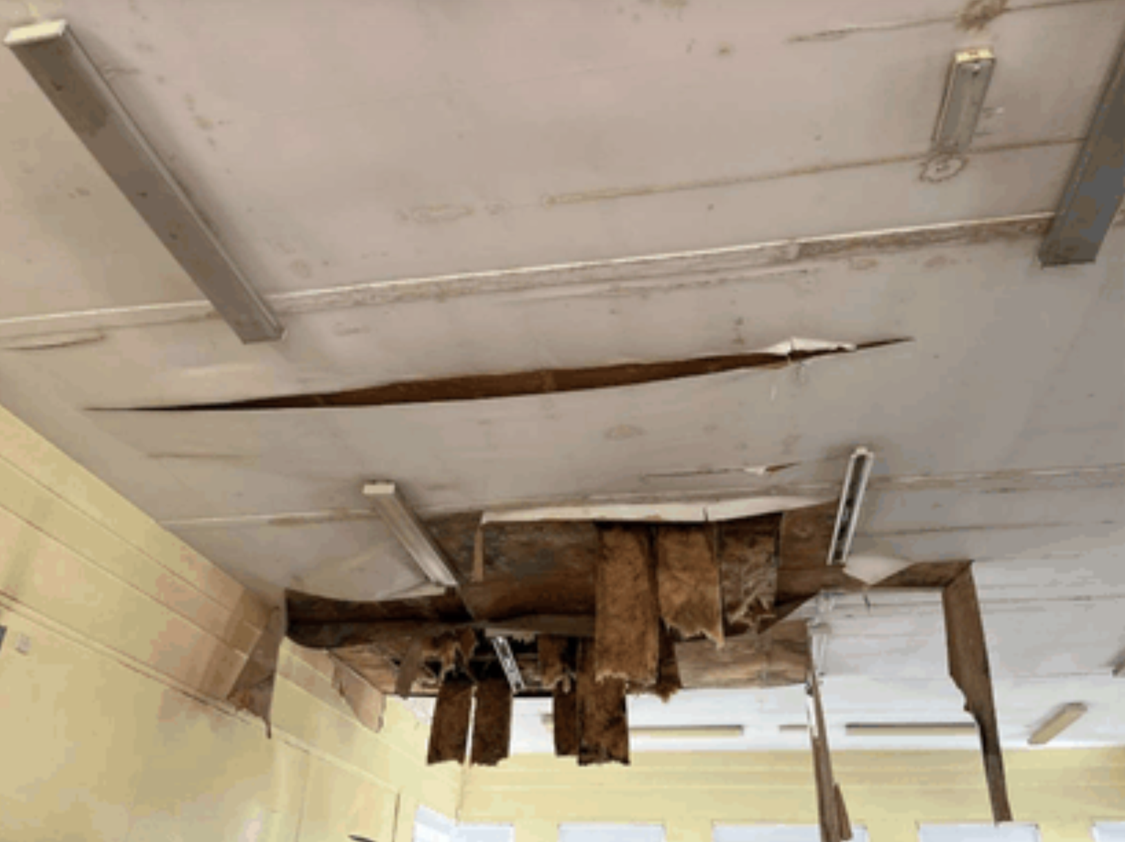 View of damage to the ceiling from a leak in 2022