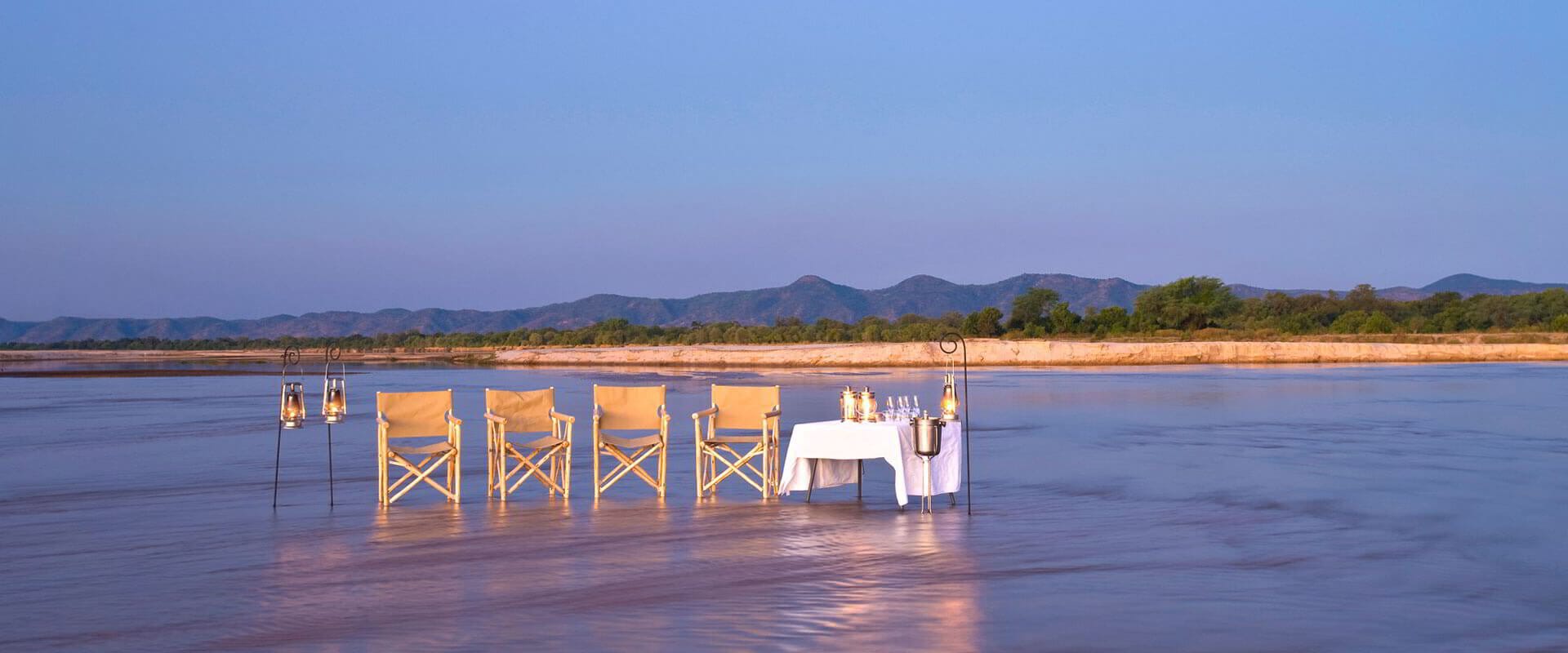 Luangwa River bend in the South Luangwa Valley with riverine bush and game in the dry season