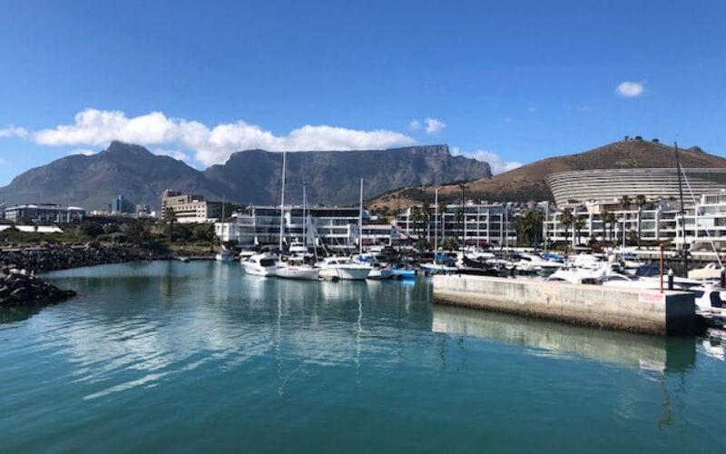 Cape Town V&A Waterfront marina with Table Mountain rising behind the yachts
