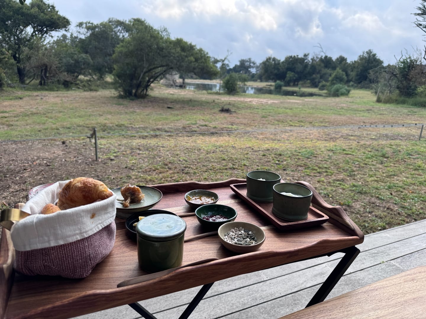 Breakfast on the deck at Monwana. Fresh fruit, granola, a small flask.