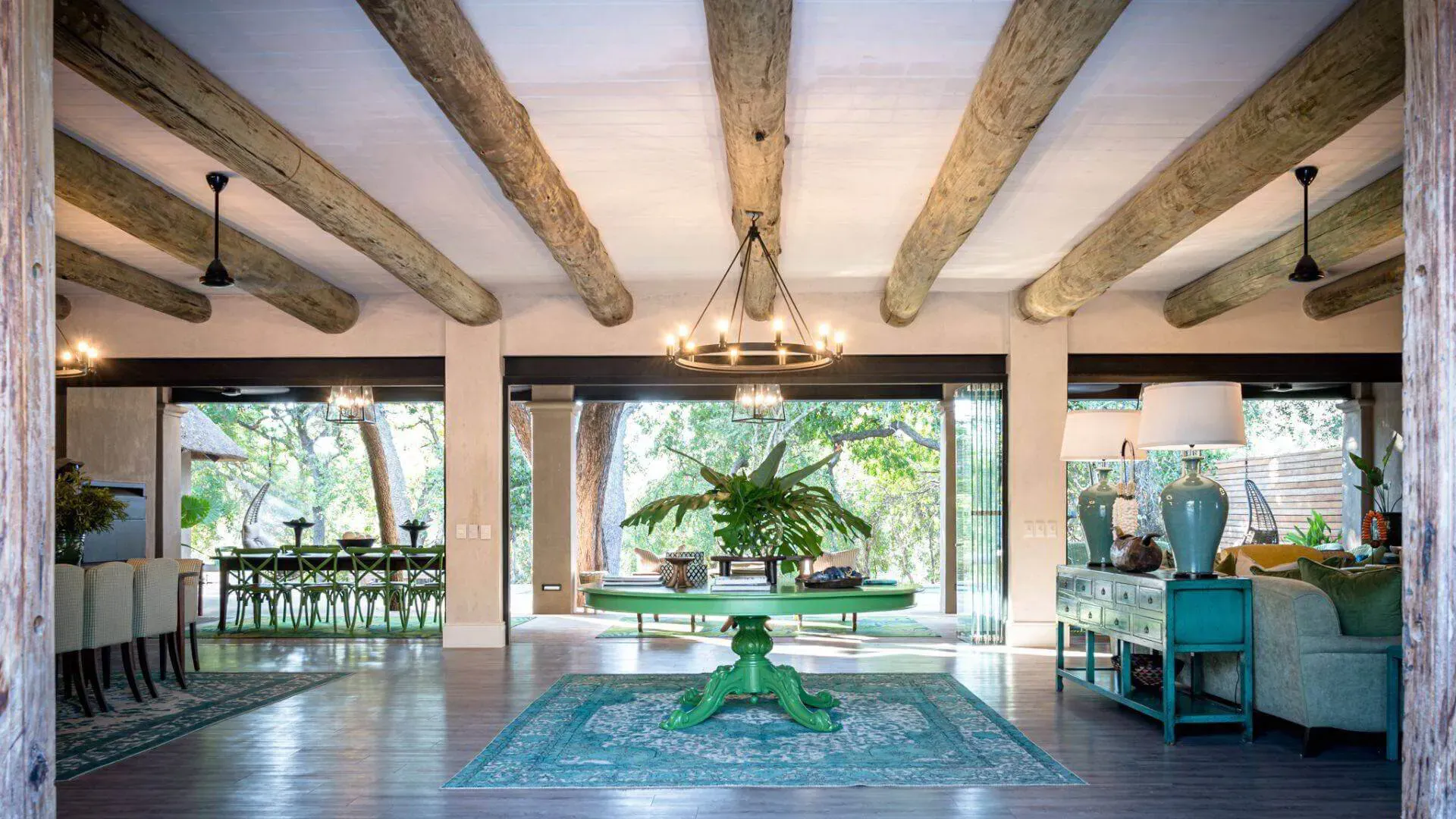 Six suites and two private villas at Waterside at Royal Malewane, set along the edge of a large Thornybush waterhole surrounded by fever trees