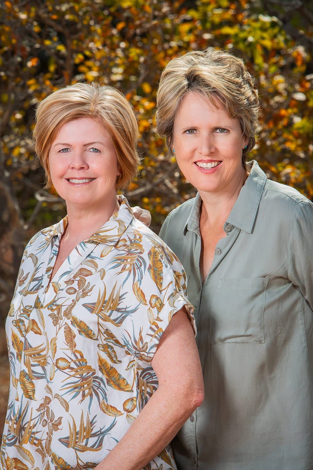 The two co-founders of Marula Hill standing side by side outdoors