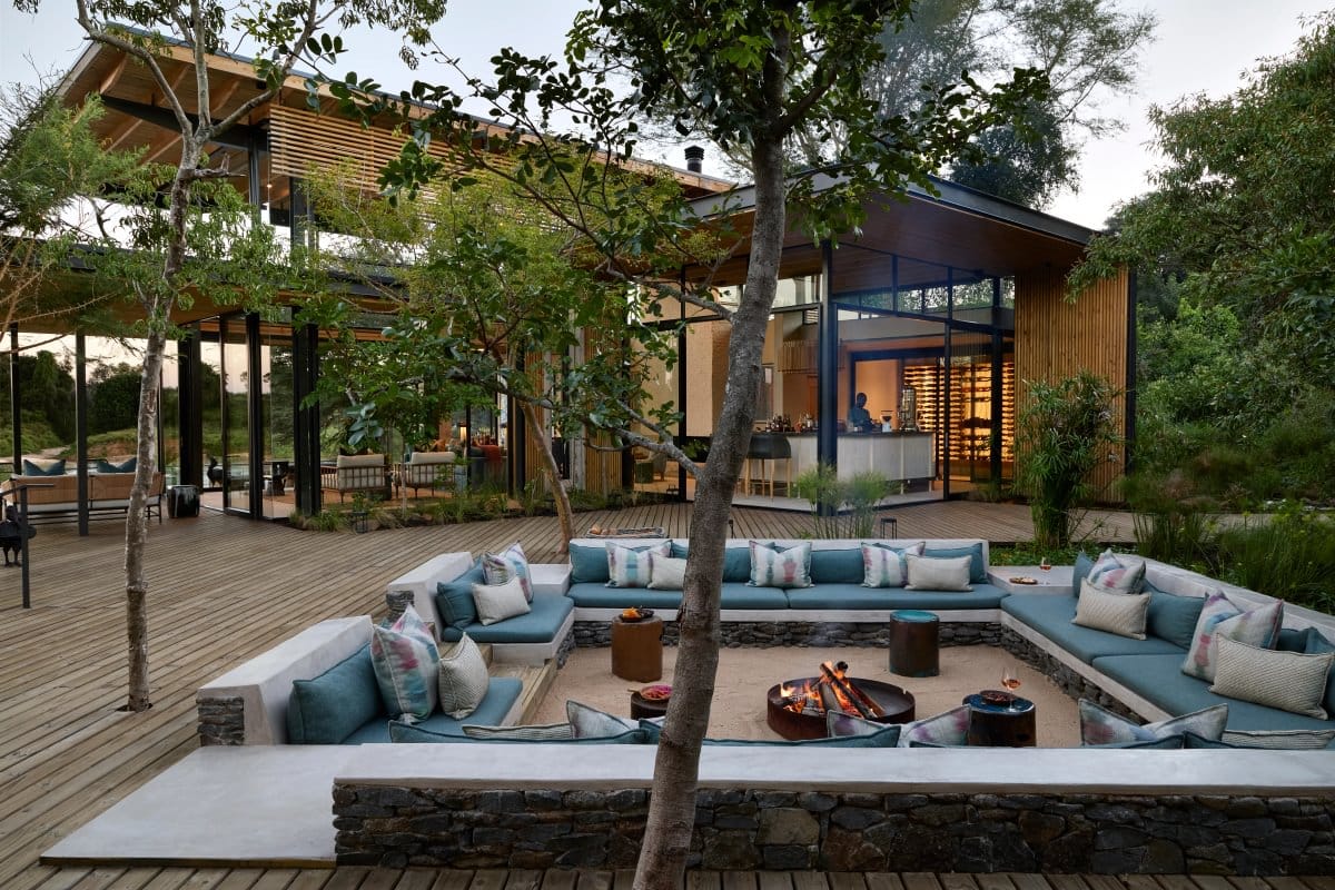 Sunken fire pit and lounge deck at a private safari lodge in the Sabi Sand