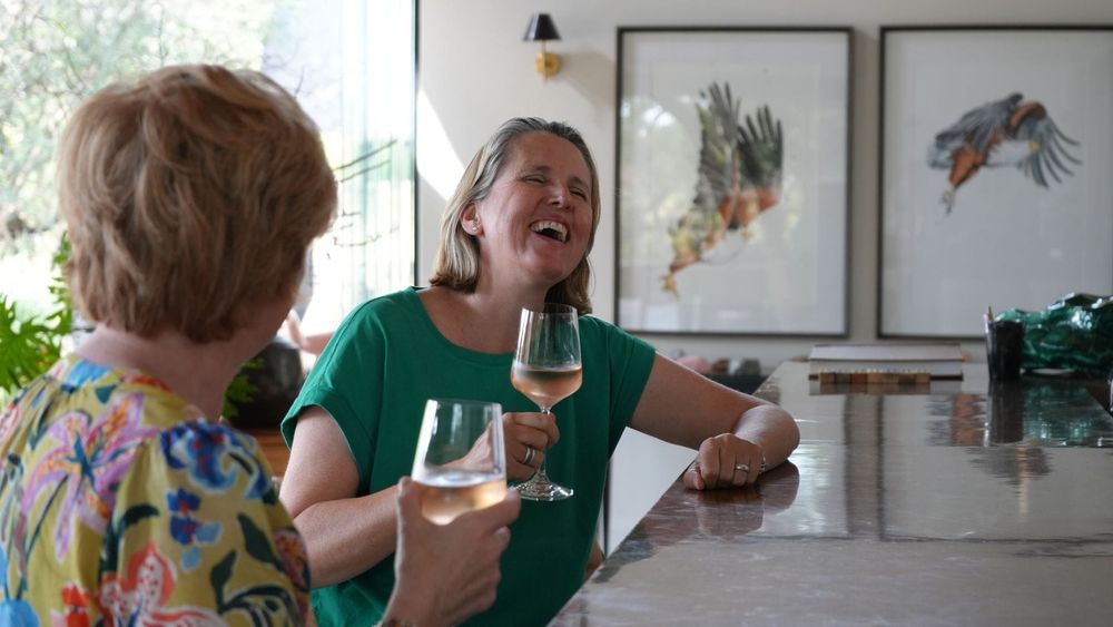 Vikki and Sian enjoying a glass of wine at Monwana