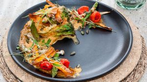 Hummus-stuffed broccoli with charred red pepper pesto