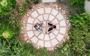 Two women meditating on their wellness safari
