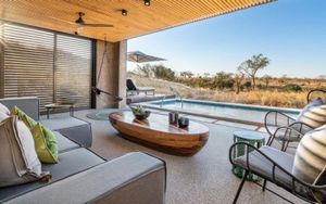 Sabi Sabi Earth Lodge exterior patio with pool in the Sabi Sand