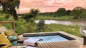 Sunset over the pool deck at a safari lodge