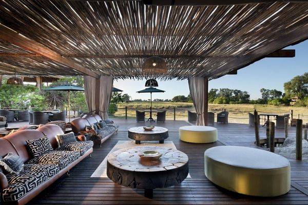 Modern luxury safari lodge lounge looking out across the Botswana bushveld