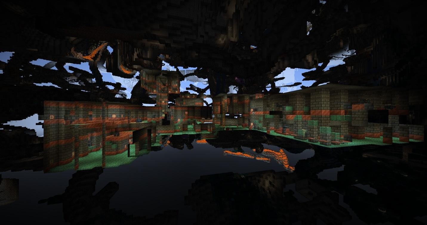 Wide underground view of a large Trial Chamber structure stretching across an open cave.