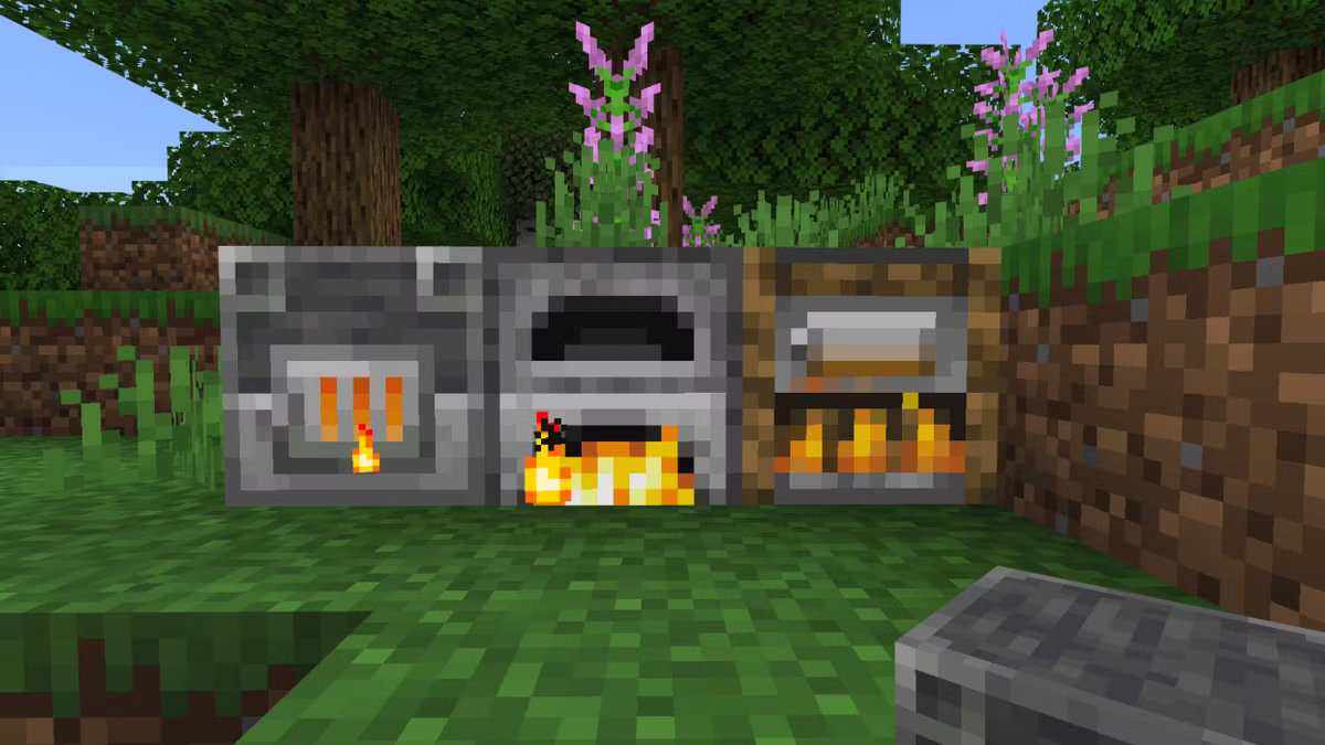 Blast furnace, furnace, and smoker placed side by side in Minecraft, all lit and active.