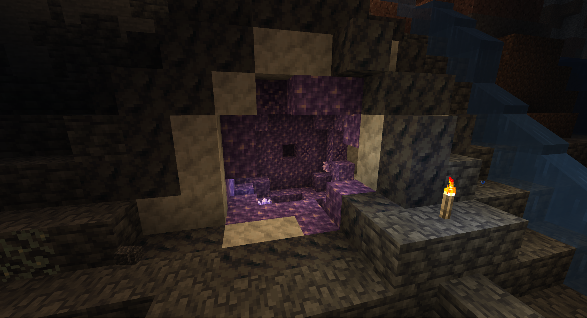 A Minecraft Screenshot of a large Amethyst Geoge in a cave.