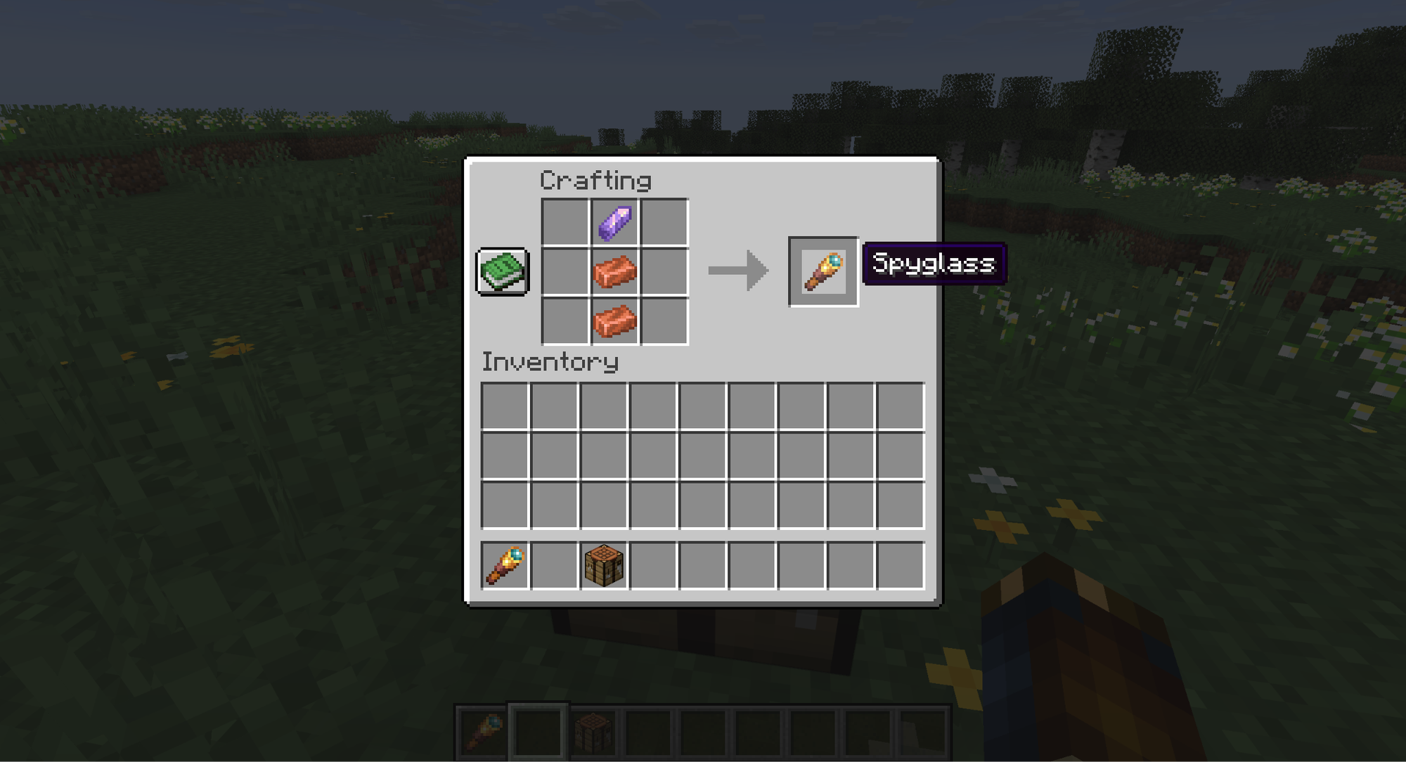 A Minecraft screenshot of a crafting table menu, showing how an Amethyst Shard and Copper Ingots make a Spyglass.