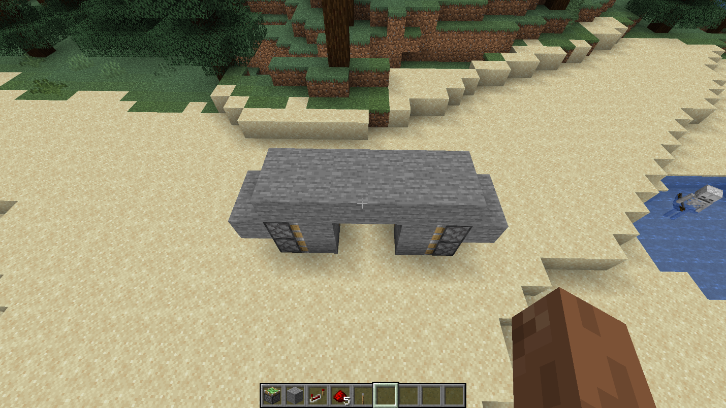 Side blocks placed beside the sticky pistons of a compact 2x2 hidden piston door in Minecraft.