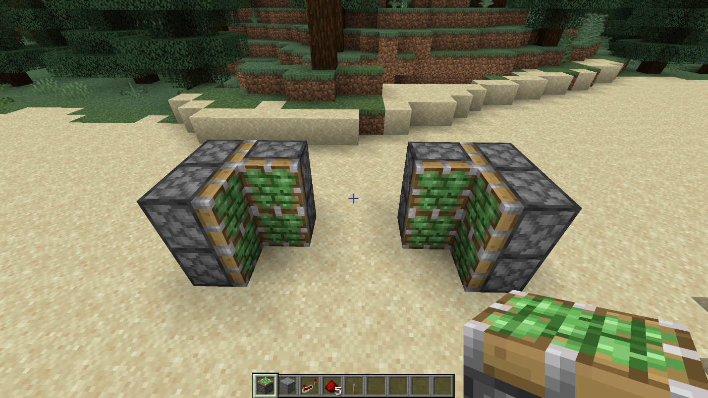 Twelve sticky pistons arranged in two mirrored groups with a 2-block gap for a hidden piston door in Minecraft.