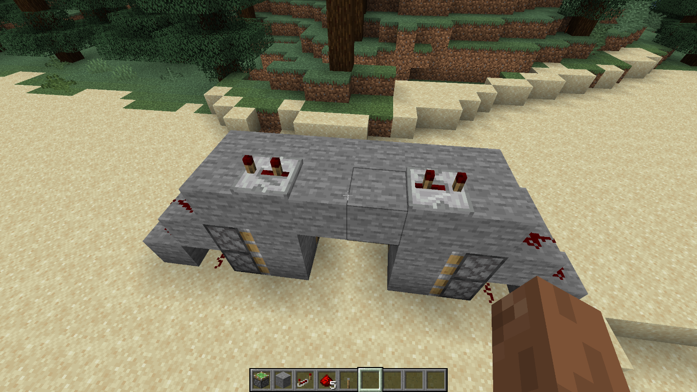 Two redstone repeaters placed on top of a compact hidden piston door mechanism in Minecraft.