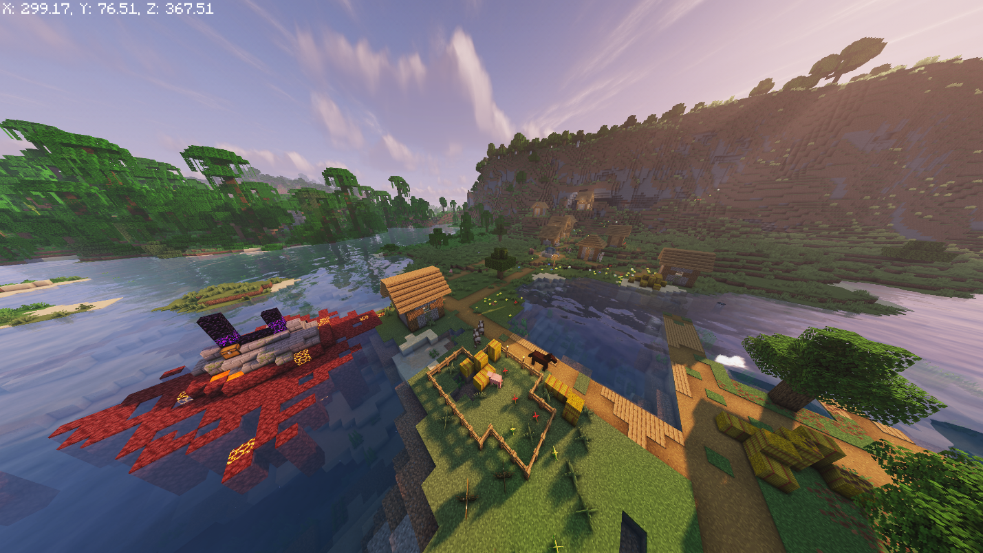 Village beside a Ruined Portal on a small island, with a fenced farm pen in the foreground.