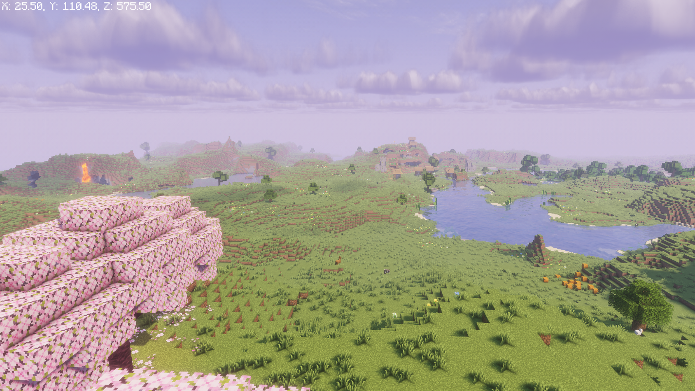 Cherry Grove overlooking a valley with a village and river below.