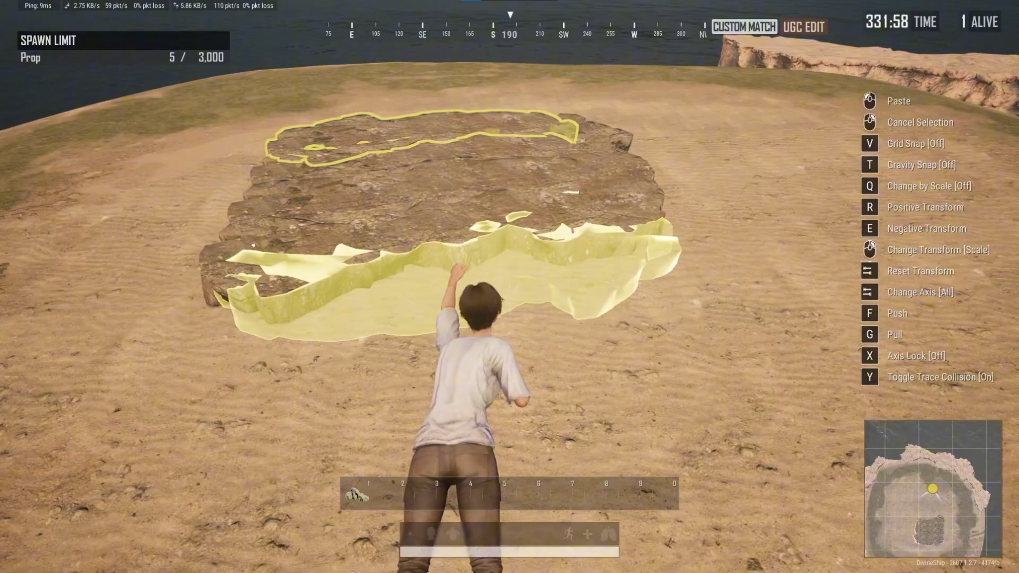 Selecting and scaling a large rock structure in PUBG UGC editor environment.