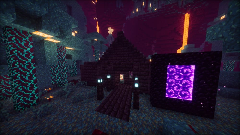 Blackstone-brick house with a pointed roof in a Nether warped forest, with soul lanterns on posts beside a dark path to the door, a Nether portal in a dark block frame on the right, and a lava fall in the background.