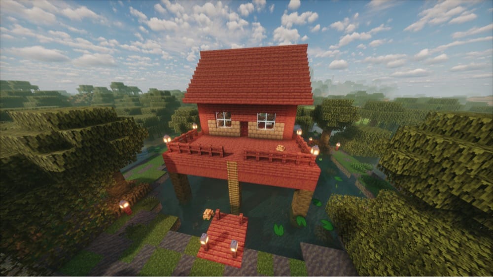 Red mangrove house on wooden stilts above a swamp pond, with a railed deck, a ladder down to a small dock, lantern posts, lily pads on the water, and two frogs, surrounded by swamp trees.