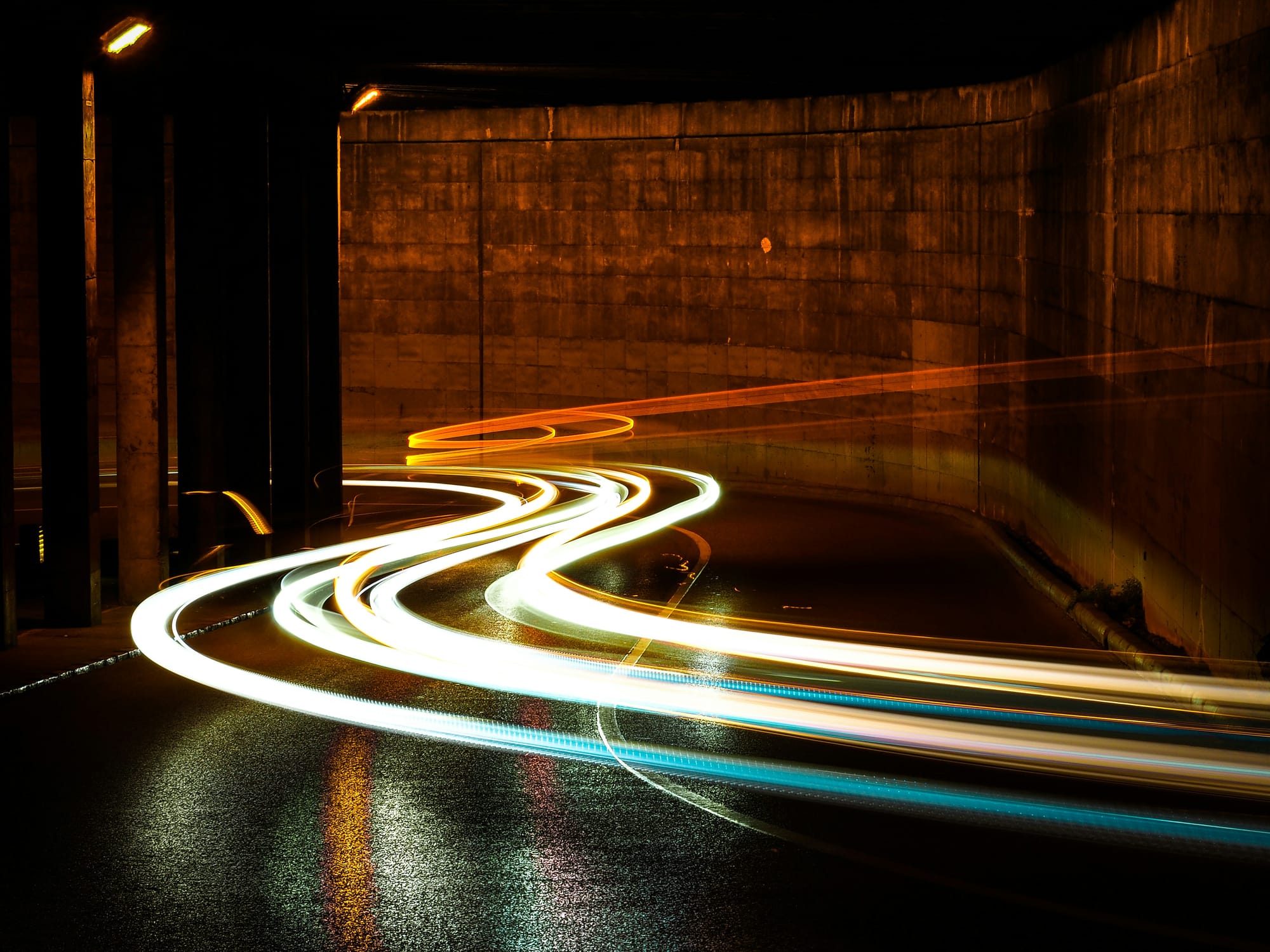 a rush of speedy light trails in a tunnel
