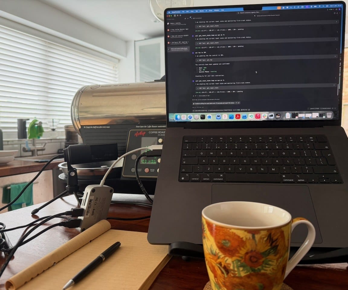 The RoastPilot rig mid-roast: the Hottop roaster, the first-crack microphone, and a live agent session driving it over MCP