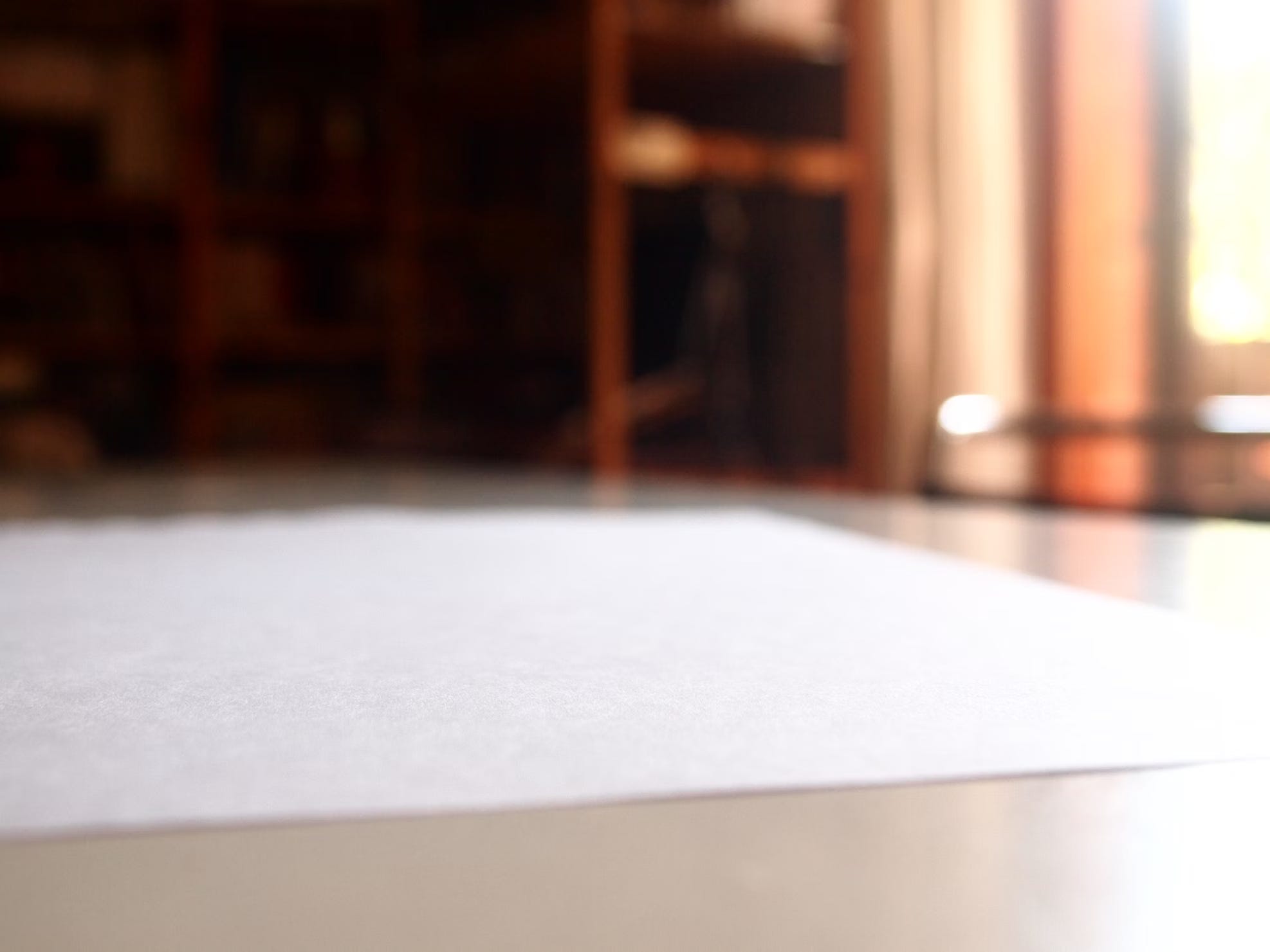 A blank sheet of paper on a table.