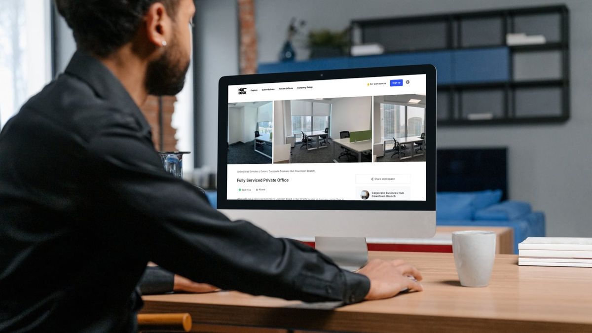 man computer updating hotdesk listing