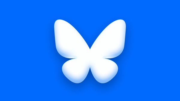 The new Bluesky logo in white against a blue backdrop