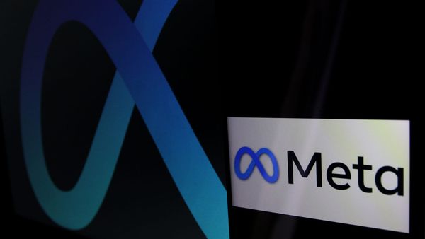 The Meta logo at an angled profile against a black backdrop next to a smartphone on its side showing the logo and wordmark