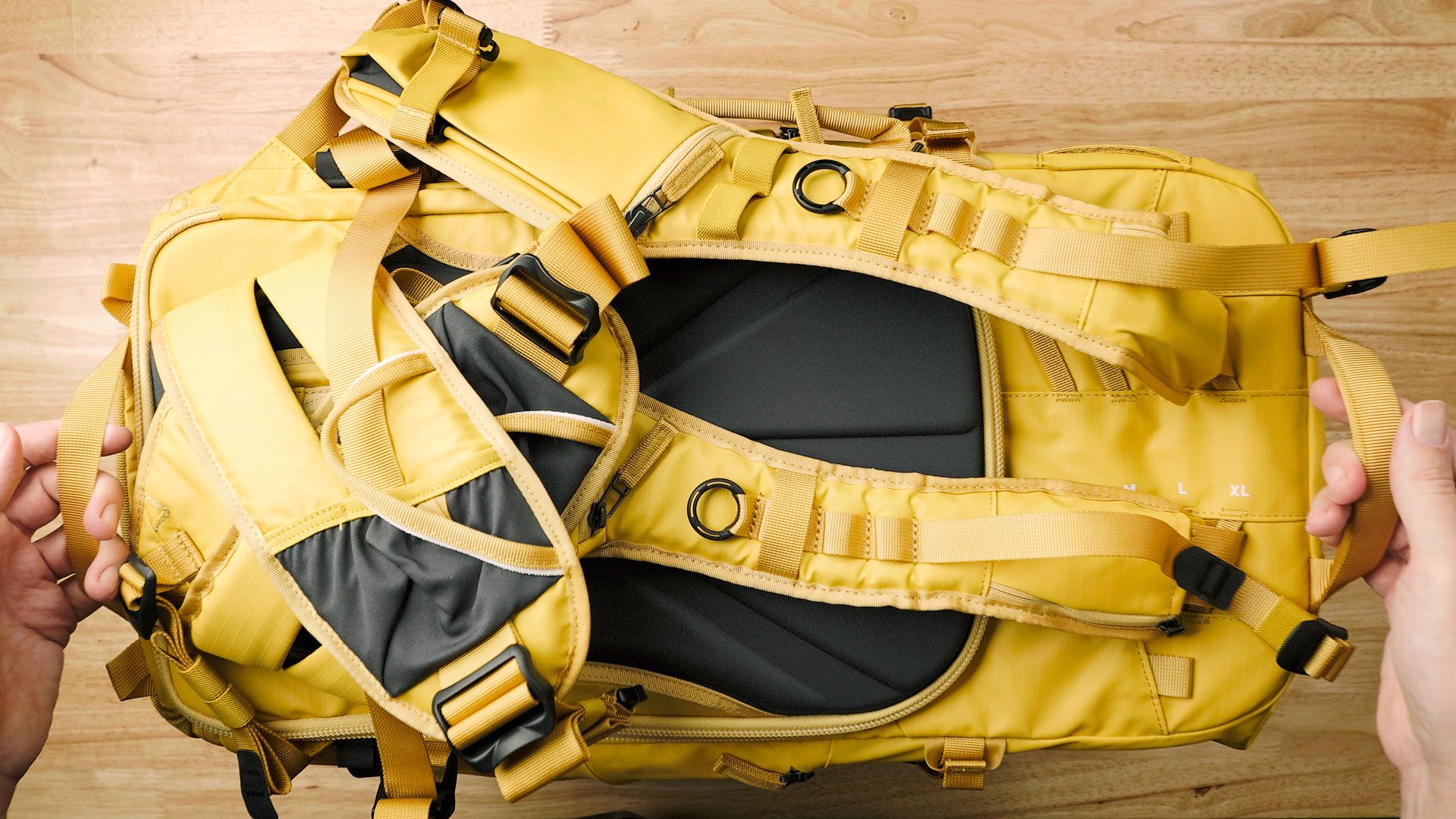 Dual handles on the backside of Shimoda Action X V2