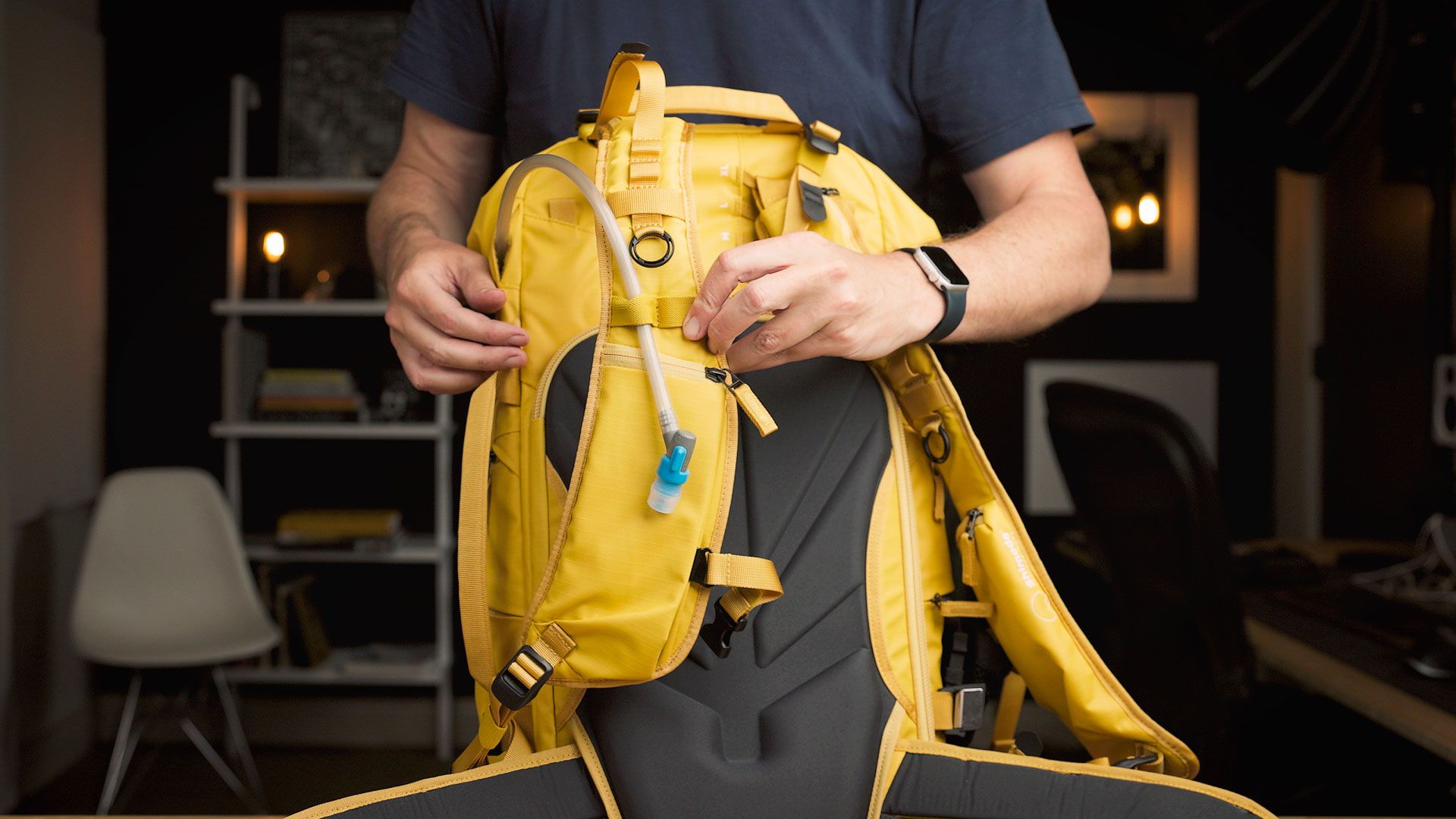 Water tube passed through to the front strap on the Shimoda Action X V2