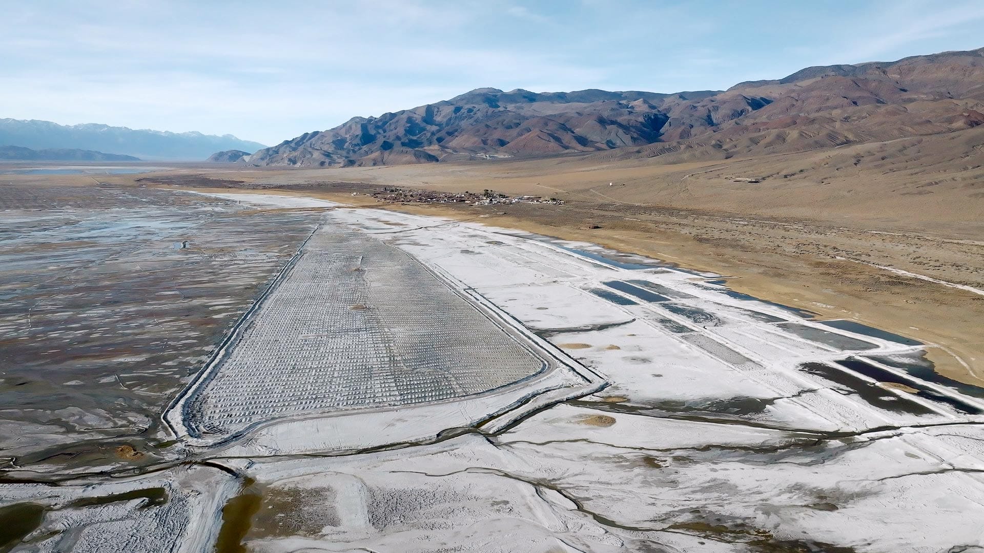 Dry lake bed in Owens Lake with Keeler in the distance